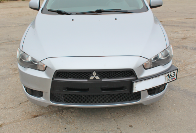 Рамка под номер на передний бампер для Mitsubishi Lancer X (2007-2016) купить недорого с доставкой в Орел